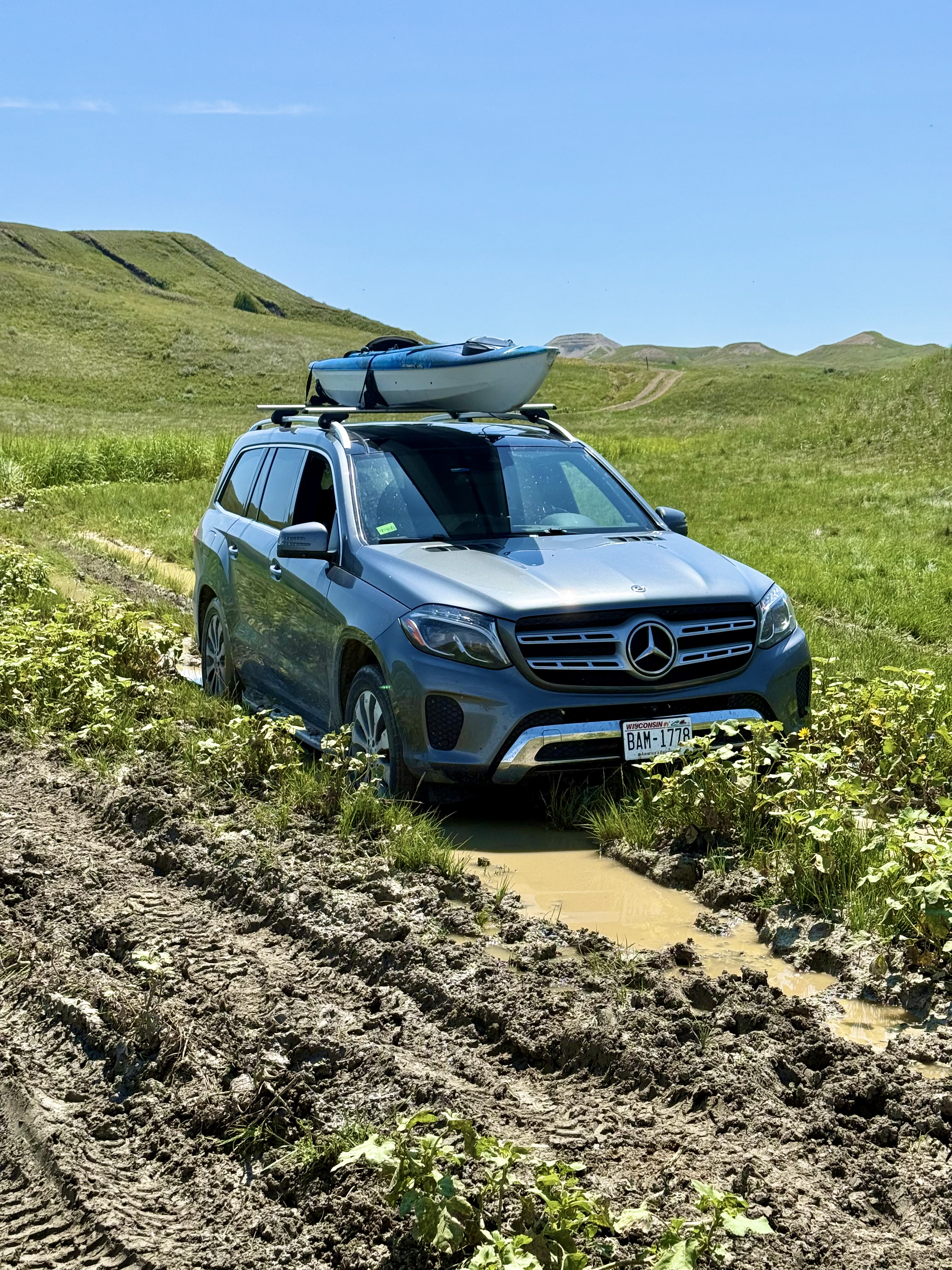 A vehicle stuck in a South Dakota mud pit — a metaphor for organizations spinning their wheels on data